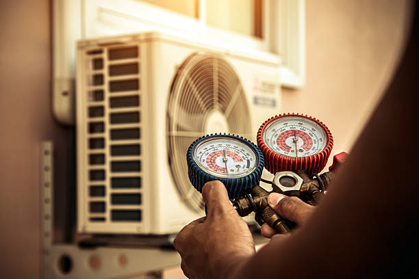 Professional Heat Pump Repair technician working in Coatesville, IN